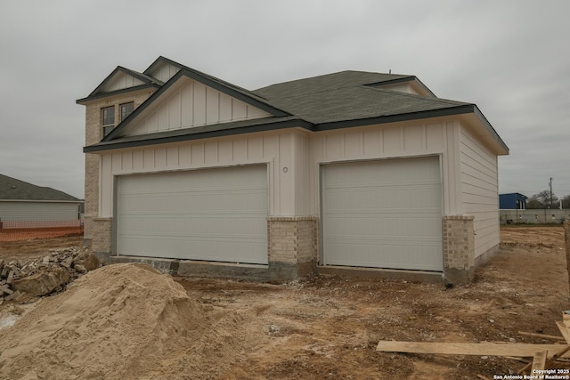 garage with driveway