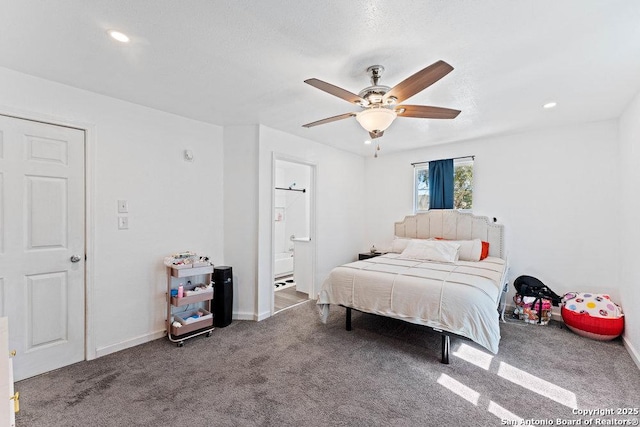 carpeted bedroom featuring recessed lighting, ceiling fan, baseboards, and ensuite bathroom