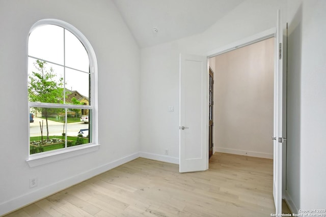 12440 Lanthimos, San Antonio, TX 78254 - empty room featuring light wood-type flooring, baseboards, and lofted ceiling