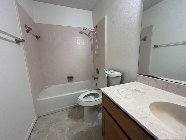 full bathroom featuring tile patterned flooring, shower / tub combination, vanity, and toilet