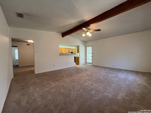 unfurnished living room featuring carpet, vaulted ceiling with beams, and a textured ceiling