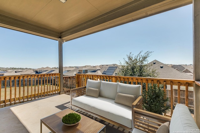 exterior space with a residential view and an outdoor living space