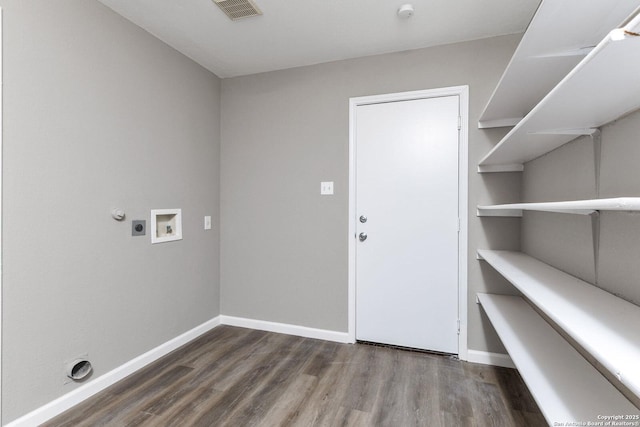 laundry room featuring hookup for a washing machine, laundry area, baseboards, and dark wood-style flooring