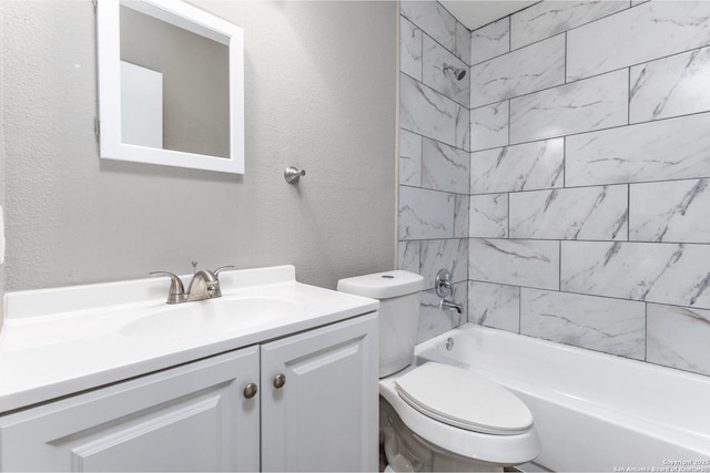 full bathroom featuring a textured wall, vanity, toilet, and shower / bathtub combination