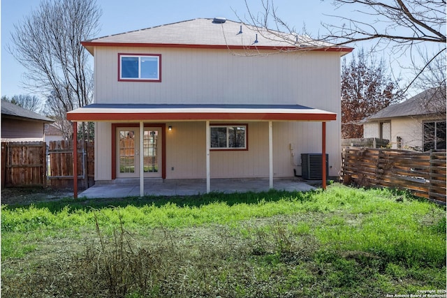 back of house with a patio area, fence, and cooling unit