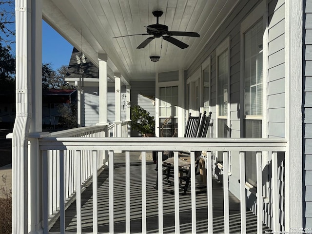 exterior space with a ceiling fan