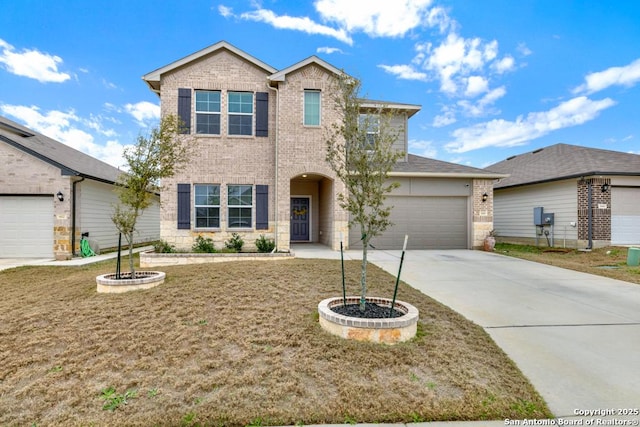 traditional home featuring a garage, concrete driveway, brick siding, and a front lawn