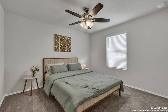 bedroom featuring a ceiling fan, baseboards, and carpet flooring