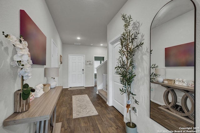 entrance foyer with baseboards, visible vents, stairway, dark wood-style flooring, and recessed lighting