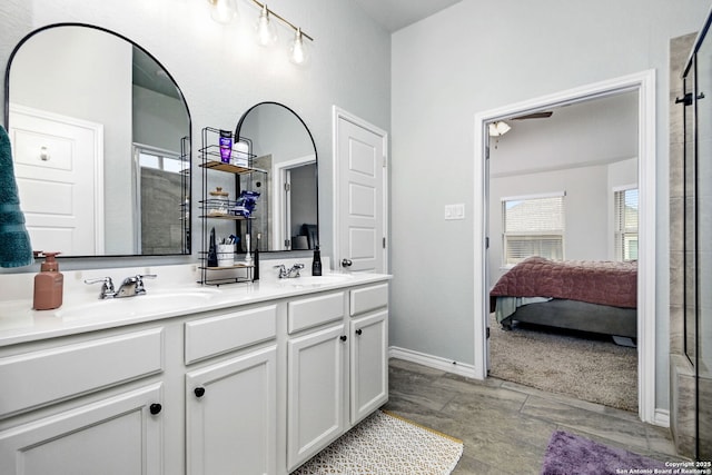 13818 Cessna, San Antonio, TX 78245 - full bath featuring double vanity, ensuite bath, baseboards, and a sink