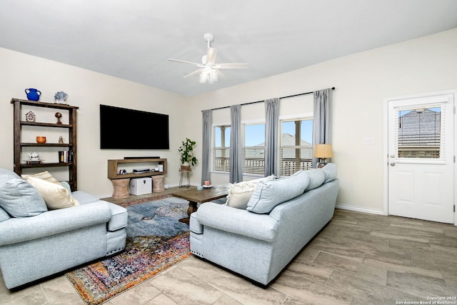 13818 Cessna, San Antonio, TX 78245 - living area with a ceiling fan and baseboards