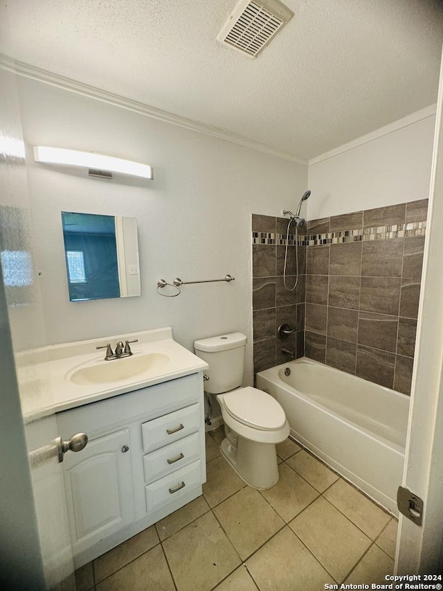 bathroom featuring a textured ceiling, tile patterned flooring, toilet, visible vents, and shower / washtub combination