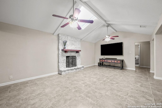 unfurnished living room featuring visible vents, baseboards, a ceiling fan, vaulted ceiling with beams, and a stone fireplace