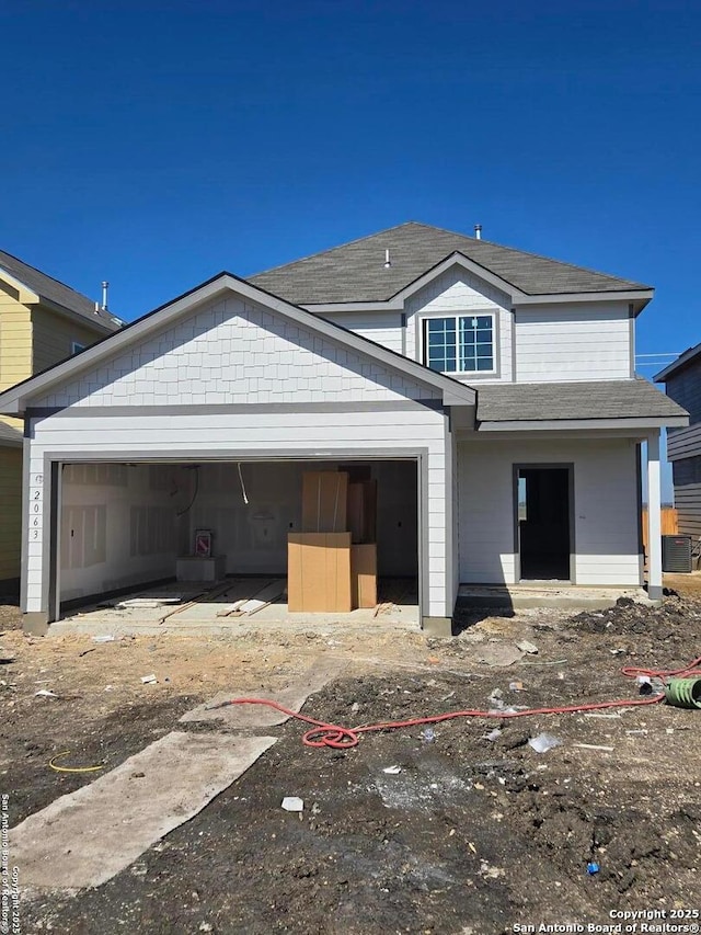 view of front of property featuring a garage