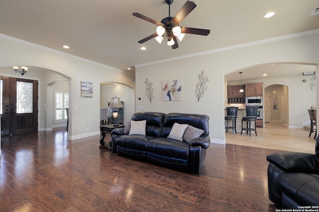 living area featuring recessed lighting, light wood-type flooring, and baseboards