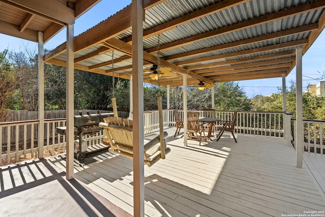 deck featuring fence and a ceiling fan