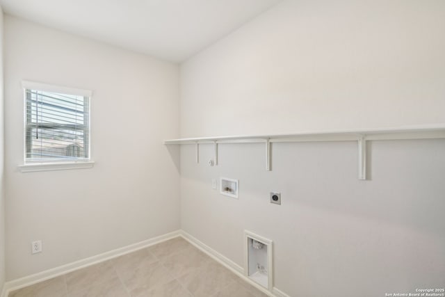 laundry area featuring washer hookup, gas dryer hookup, electric dryer hookup, laundry area, and baseboards