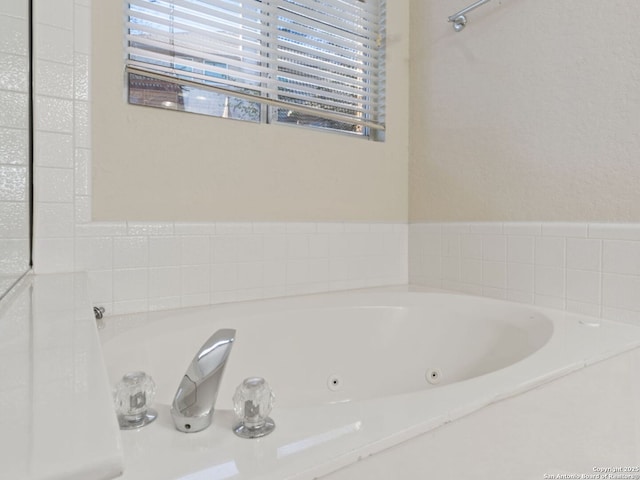 bathroom featuring a jetted tub