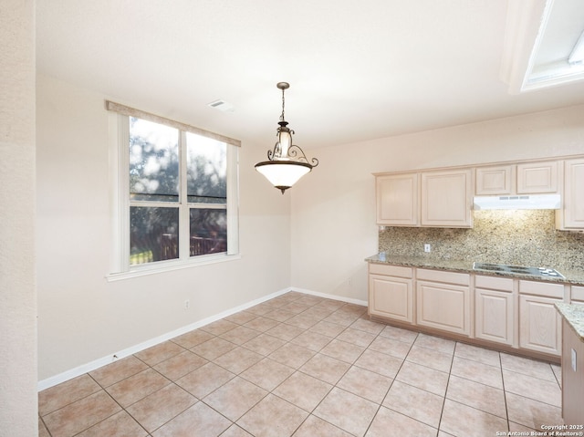 unfurnished dining area with visible vents, baseboards, and light tile patterned flooring