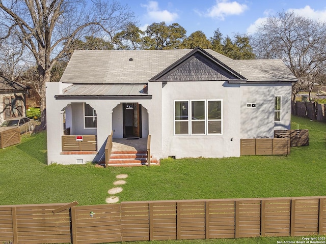 view of front of property with fence private yard, covered porch, crawl space, and stucco siding