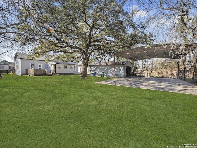 445 Cooper St, San Antonio, TX 78210 - view of yard with driveway and a carport
