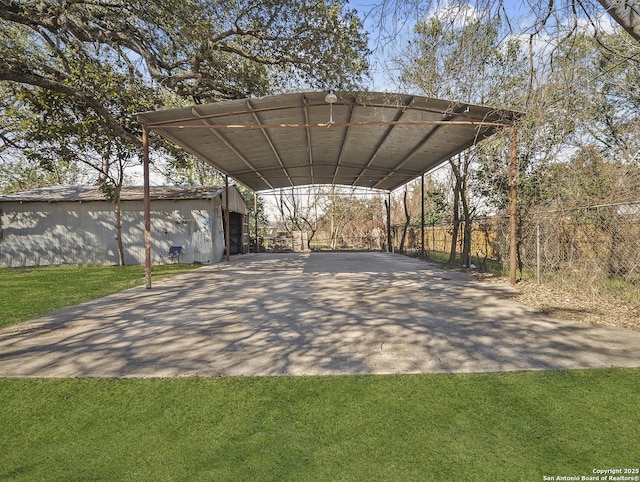 445 Cooper St, San Antonio, TX 78210 - view of parking featuring driveway and fence