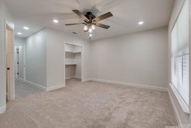 empty room with recessed lighting, visible vents, baseboards, and light colored carpet