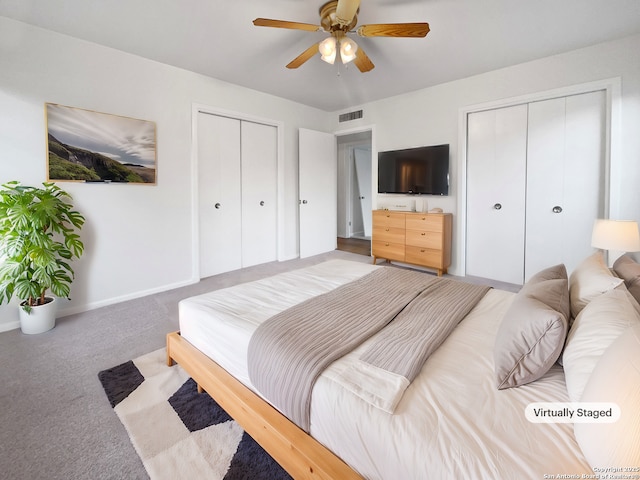 bedroom with a ceiling fan, visible vents, baseboards, a closet, and carpet