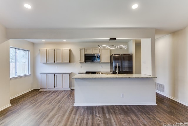 kitchen with appliances with stainless steel finishes, dark wood-style flooring, visible vents, and recessed lighting