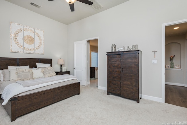 bedroom with visible vents, ceiling fan, light carpet, and baseboards