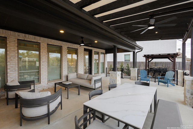 view of patio / terrace with outdoor dining space, fence, an outdoor living space, and a pergola