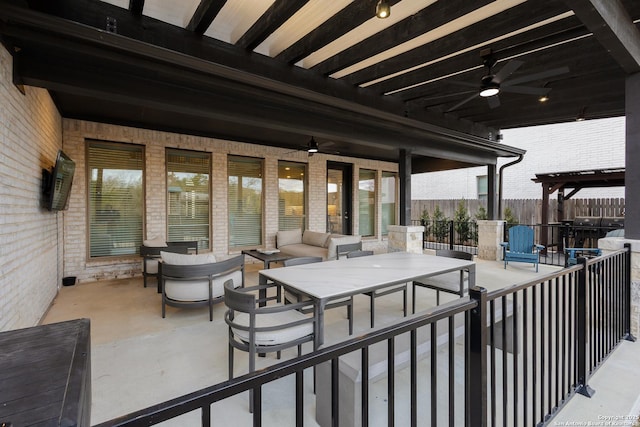 view of patio featuring ceiling fan, outdoor dining area, outdoor lounge area, and fence