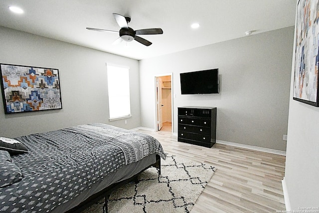 bedroom featuring baseboards, ceiling fan, recessed lighting, and light wood-style floors