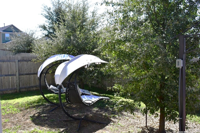 view of yard featuring fence