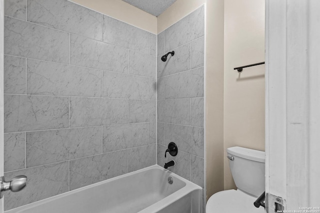 bathroom featuring toilet and tub / shower combination