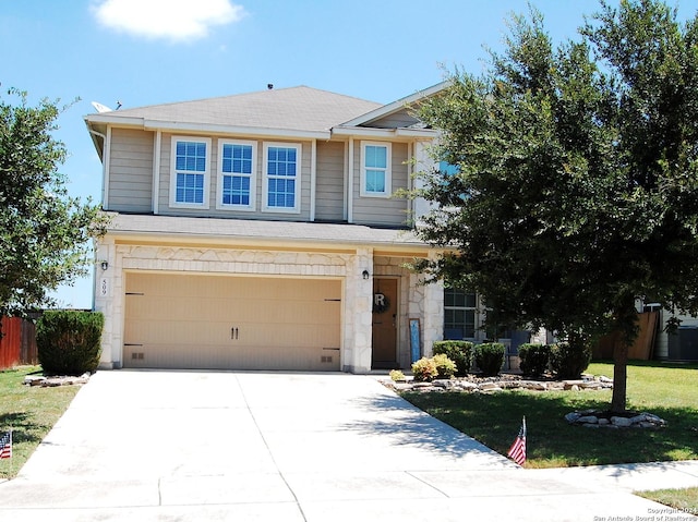 traditional home with driveway, stone siding, and an attached garage