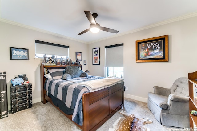 bedroom with ornamental molding, light colored carpet, and baseboards