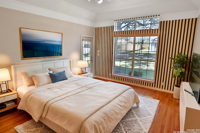 bedroom featuring wood finished floors