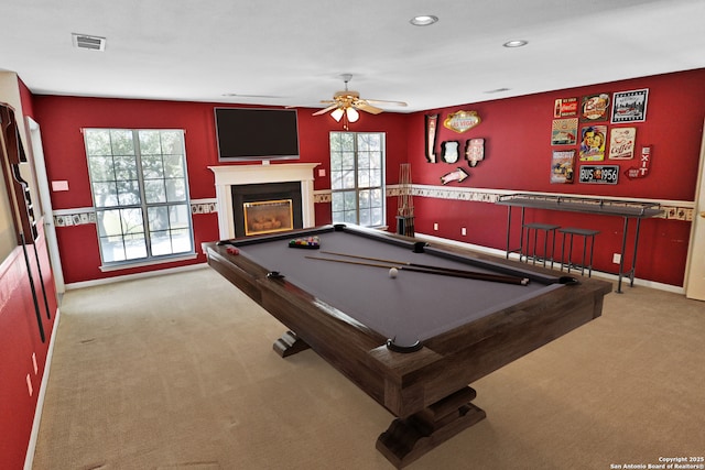 game room with a fireplace, recessed lighting, visible vents, a ceiling fan, and light carpet