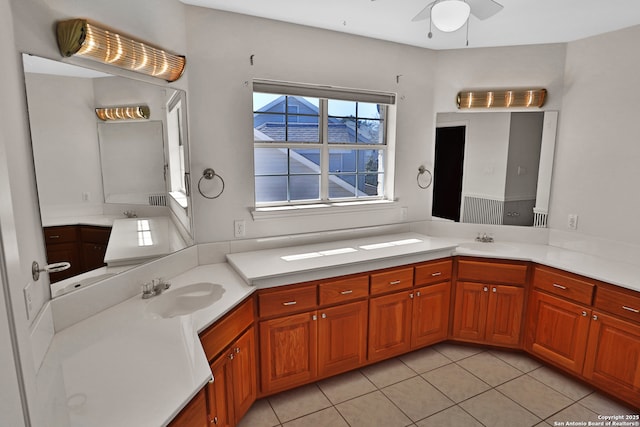 bathroom with ceiling fan, vanity, and tile patterned floors