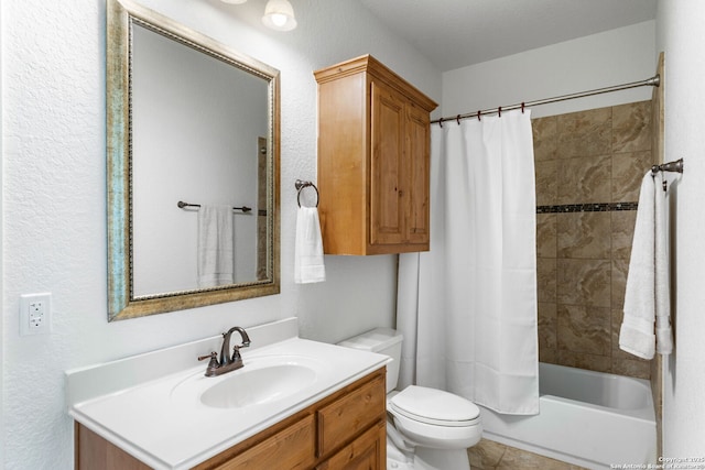 bathroom with toilet, shower / bath combo, and vanity