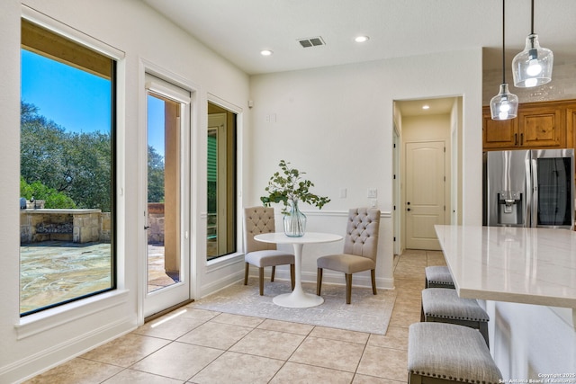 dining area with recessed lighting, visible vents, and light tile patterned floors