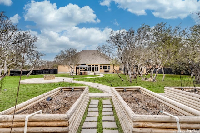 exterior space with a yard, a patio, and fence