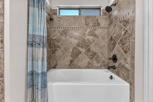 full bathroom with shower / tub combo