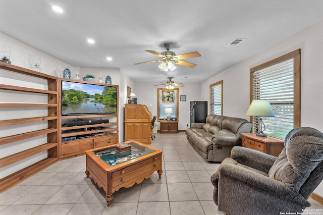 living area with a ceiling fan, light tile patterned flooring, visible vents, and recessed lighting