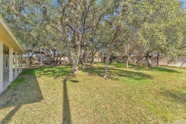 view of yard featuring a fenced backyard