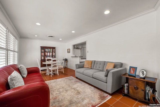 living area featuring recessed lighting, tile patterned floors, visible vents, and crown molding