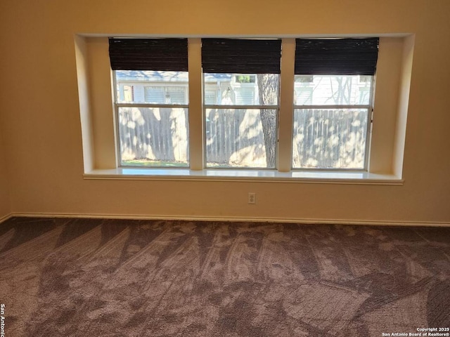 empty room with carpet floors