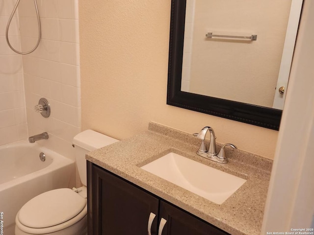 full bathroom with shower / washtub combination, vanity, and toilet