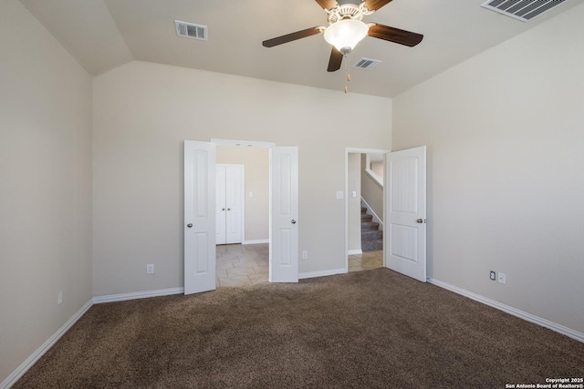 unfurnished bedroom featuring baseboards, visible vents, and light colored carpet